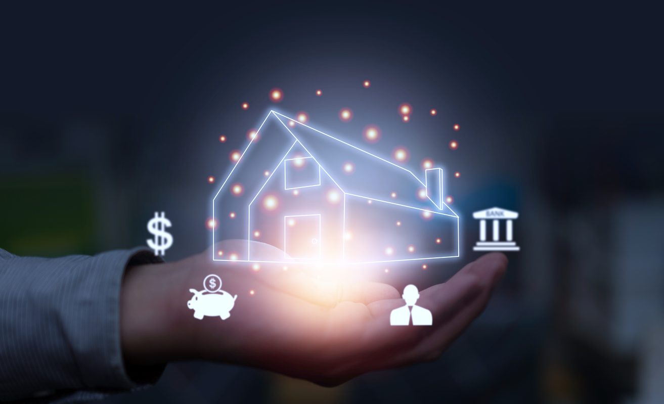 A graphic depicts a hand holding a "digital" house icon surrounded by other financial icons (dollar sign, bank, piggy bank) for data-driven-strategies-to-help-mortgage-lenders blog.